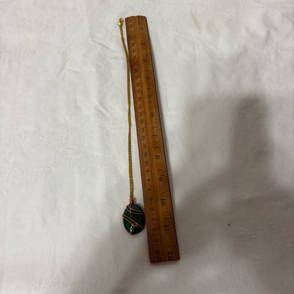 malachite wire-wrapped pendant with a gold-toned chain. - Picture 4 of 6